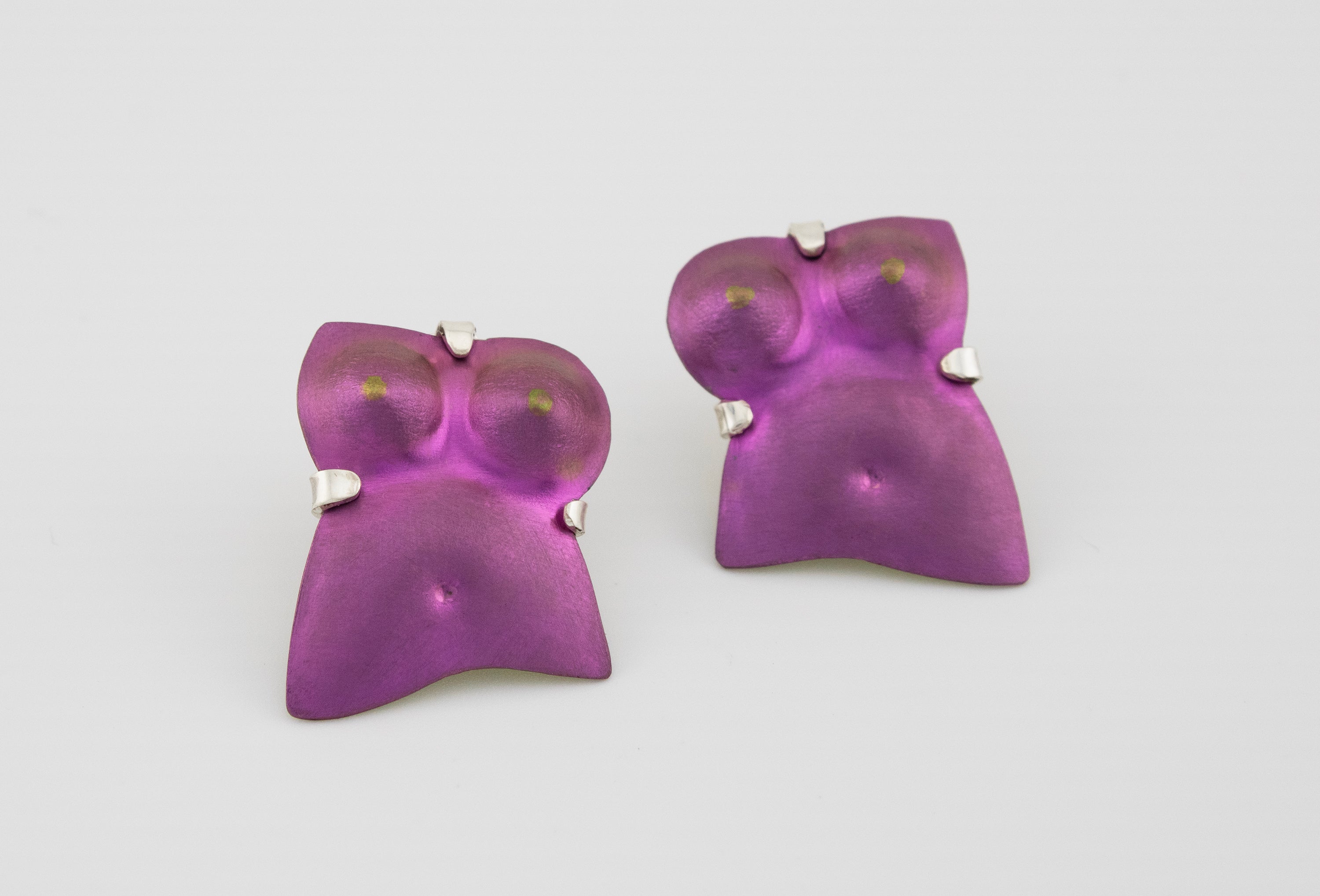 Niobium body earrings